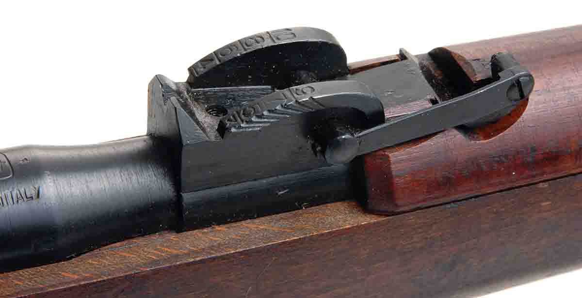 The Italians got innovative with this rear sight found on the Model 1941. The combat sight was the large, notched block of steel set for 300 meters. For elevation adjustments the sight has a rearward rotating sight leaf.